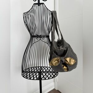 Grey denim barrel shoulder bag with bow detail